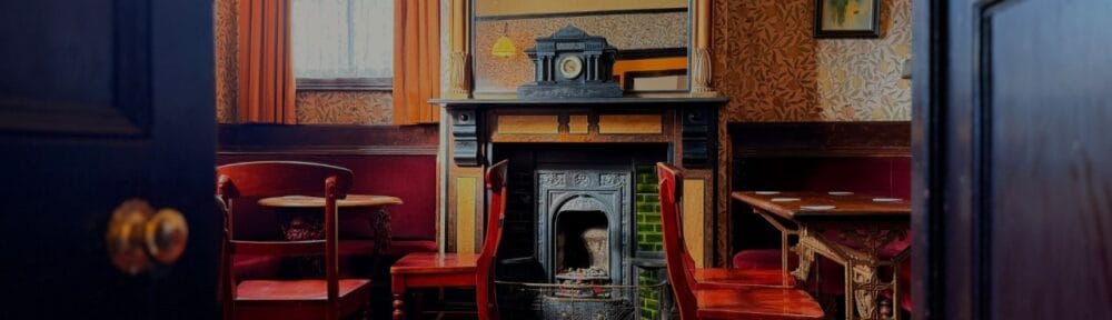 Traditional pub room with a fireplace